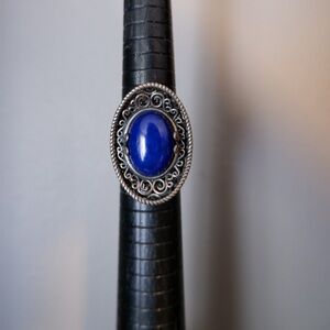 Sterling silver and lapis lazuli ring. Size 8 unique shape.